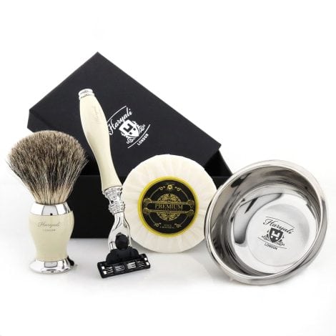 Gift set for men, featuring a razor with an ivory resin handle, a badger shaving brush, shave soap, and a bowl. Perfect for Christmas gifting.