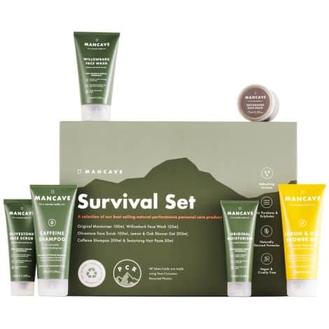 ManCave Survival Gift Set: A collection of six natural grooming products for men, including shower gel, shampoo, face wash, face scrub, and moisturizer. These vegan products come in plastic-free packaging and are proudly made in England.