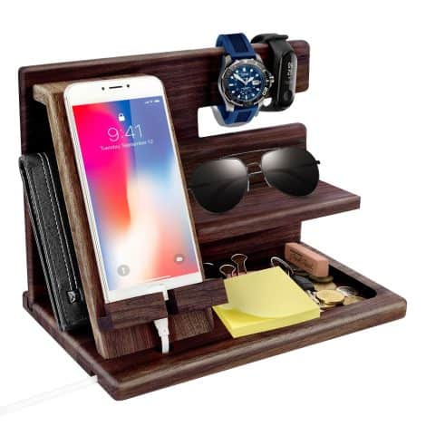 Christmas presents for males, including a wooden phone docking station, a dad’s bedside table organizer, and a wallet/watch stand.