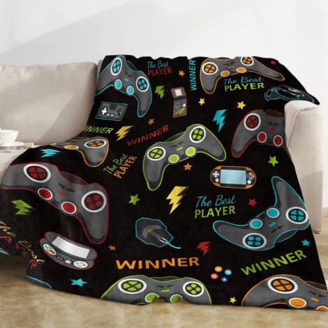 Soft flannel gaming blankets designed for boys, featuring a cozy fleece material, gamepad patterns, and a fluffy texture. Perfect for gifting to teenage game enthusiasts. Sized at 130x152cm for use on sofas, couches, and beds.