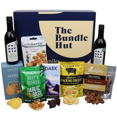 British English Paraphrase: Hamper Box with Red Wine, Chocolate, and Snacks from The Bundle Hut – Includes 2 Red Wine Bottles, Popcorn, Olives, Cheese, Chocolate & More – Gift for Both Genders (Blue Box).