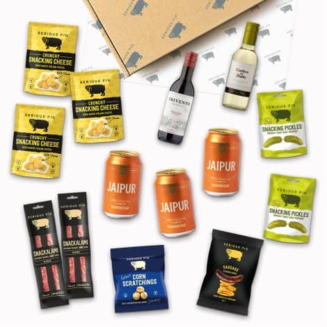 Serious Pig’s “Pub In The Post” offers a delectable gift hamper of 14 packs, including craft beer, snacks, and more.