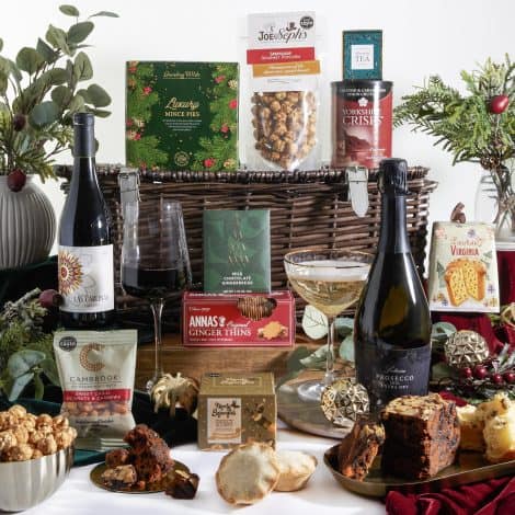 Christmas Hamper filled with festive items such as mince pies, chocolates, Prosecco and red wine, perfect for couples and families.